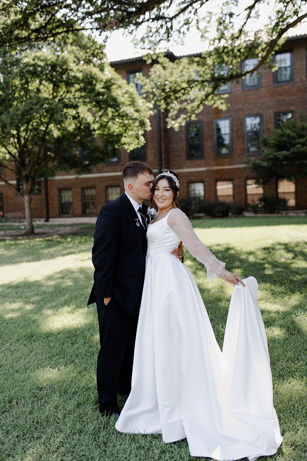 Outdoor wedding with building backdrop